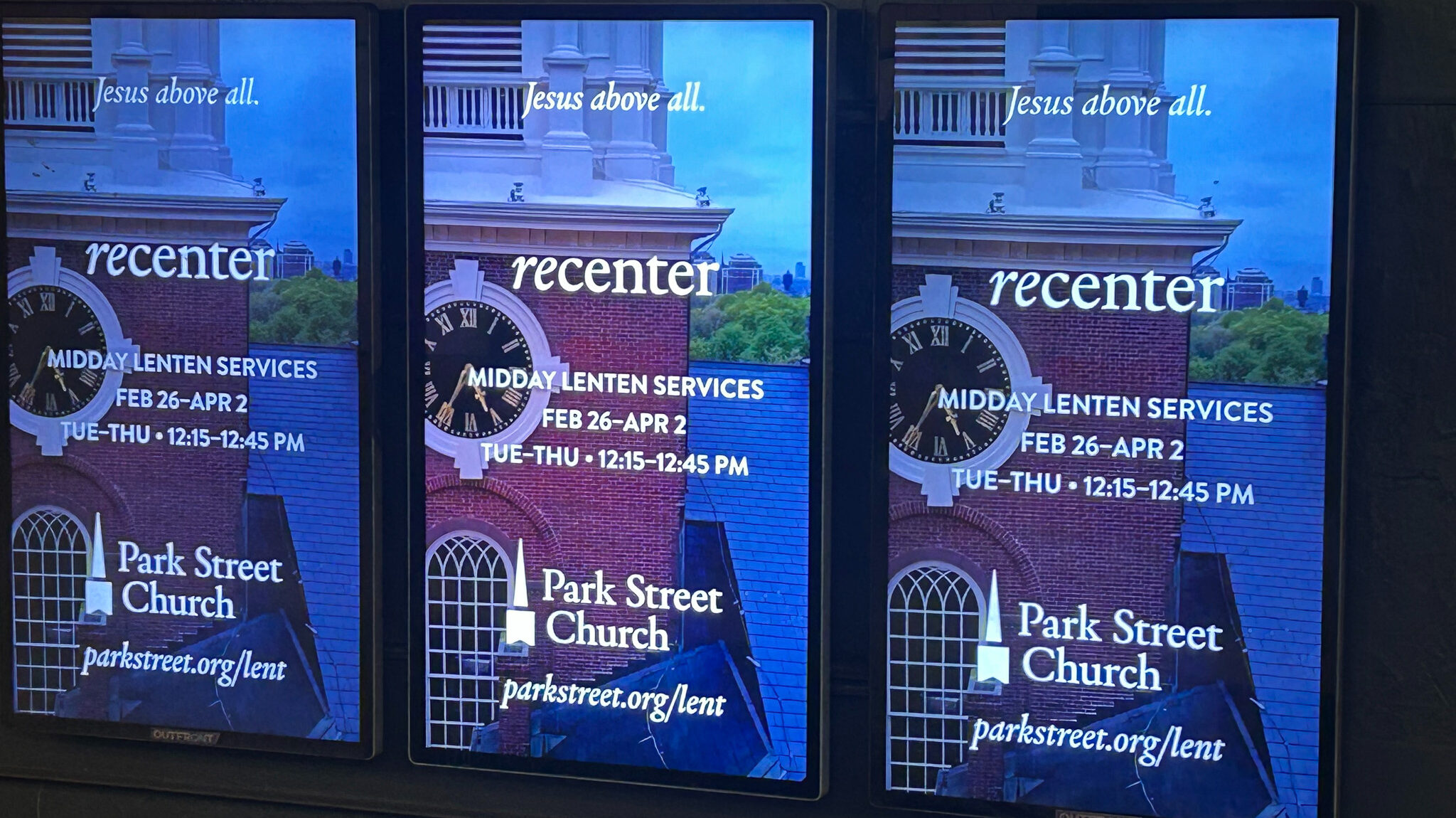 The Park Street Church Midday Lenten Services campaign on video screens in the Park Street MBTA station, Boston, MA